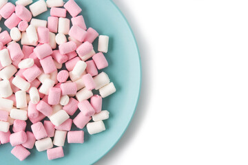 Sweet marshmallows topping isolated on white background. Top view. Copy space