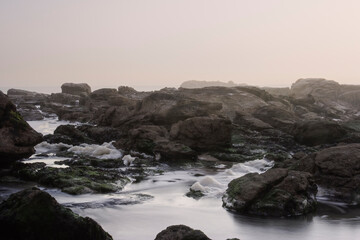 Rocky beach at dusk