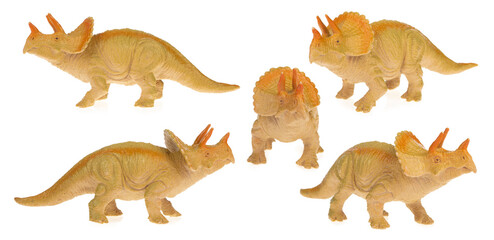 Collection of Triceratops dinosaur toy isolated on white background.
