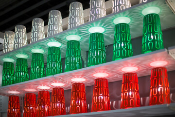Multicolored lighting lights on the shelf of the store