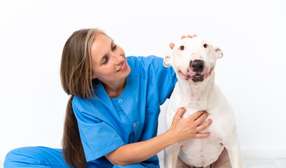 Young veterinarian English woman with dog