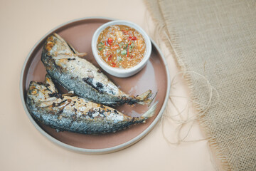 Fried mackerel fish with spicy shrimp paste sauce, (Nam prik kapi pla too).