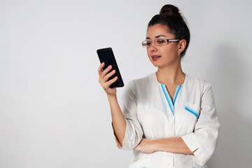 Woman Doctor with smartphone background