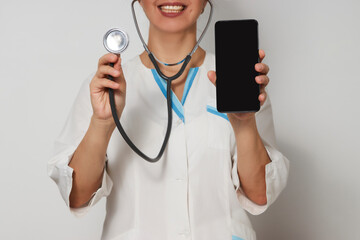 Woman Doctor with smartphone background