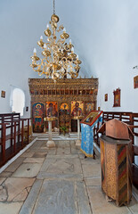 Fototapeta na wymiar Interior of an orthodox church in Naoussa, Paros, Greece
