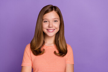 Portrait of attractive cheerful content brown-haired girl good mood isolated over vivid violet purple color background
