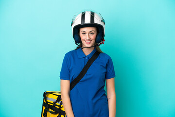 Young caucasian woman with thermal backpack isolated on white background laughing