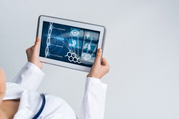 Close of female doctor hands working with tablet pc computer