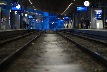 Frog perspective of railway platforms at Zürich main station on a foggy winter morning. Photo taken December 15th, 2021, Zurich, Switzerland.
