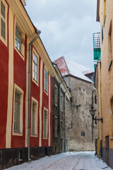 Perspective view of buildings on the Aida Street in overcast winter day, Tallinn Old Town, Estonia
