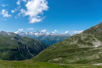 Fototapeta na wymiar Alpine landscape from the Nufenen Pass with the mountain Finsteraarhorn