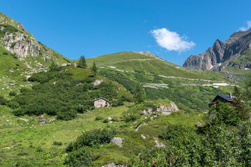 Fototapeta na wymiar Alpine landscape along the Nufenen Pass road near the Nufenen Pass