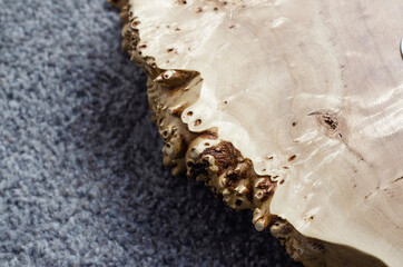 Wooden background. Wood texture. Epoxy resin is white. Burl maple.