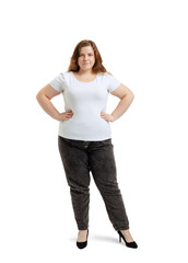 Full-length portrait of plus-size woman wearing white t-shirt and jeans posing isolated on white studio background. Body positive concept