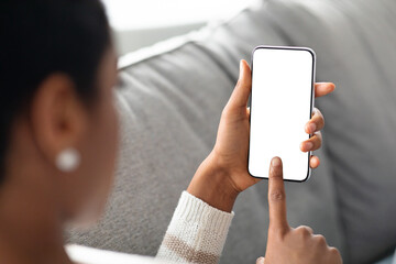 Unrecognizable Black Female Touching Blank Smartphone Touchscreen At Home