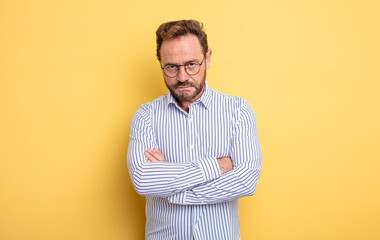 middle age handsome man feeling displeased and disappointed, looking serious, annoyed and angry...
