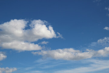 white clouds in the blue sky