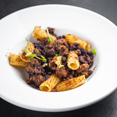 rigatoni pasta beans sauce healthy meal food diet snack on the table copy space food background rustic. top view veggie vegan or vegetarian food no meat