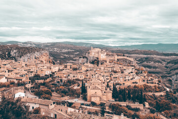 Fototapeta na wymiar View of the typical spanish medieval village of Alquezar above Vera river in Aragon region, Huesca, Spain