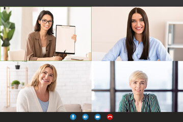 Group conference with happy women smiling and looking at camera on device screen, making video call, chatting online