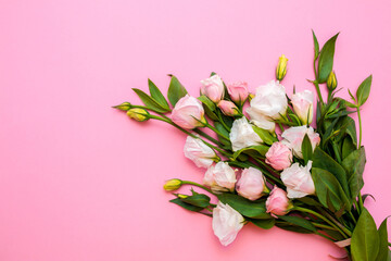 Festive bouquet of flowers for the beloved on a pink background. The concept of love congratulations on the wedding, March 8, Valentine's Day, Christmas and birthday. Copy space.