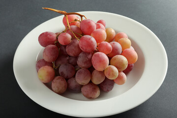 fresh grapes in the plate