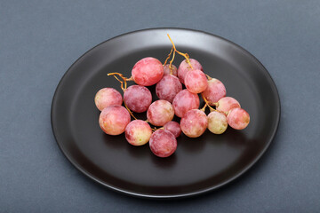 fresh grapes in the plate