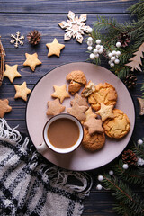 Composition with spruce branches on a wooden background. Christmas composition.