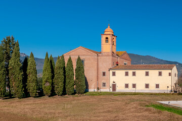 Fototapeta na wymiar Parish church of the Madonna dell'Acqua in Cascina, Pisa, Italy, on a sunny day