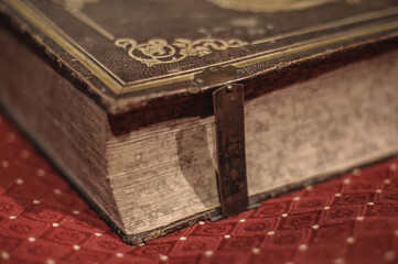 Authentic ancient holy bible book on altar in church cathedral