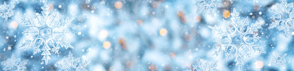 Winter snow background banner abstract bokeh. Snowflake Close-Up. Free space for text.