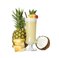 Tasty Pina Colada cocktail and ingredients on white background