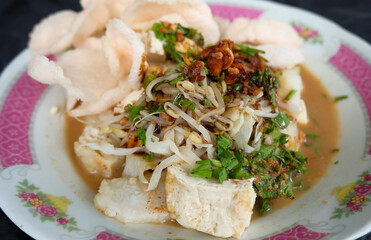 Kupat Tahu - Indonesian traditional food from Magelang, Indonesian traditional food made from rhombus, vegetables and tofu with peanut sauce