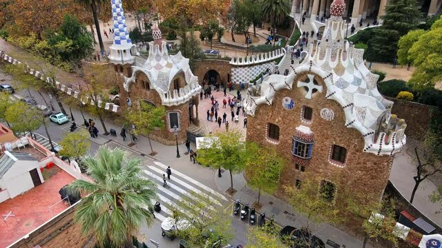 Aerial drone view of Barcelona, Spain. Park Guell with tourists, a lot of greenery