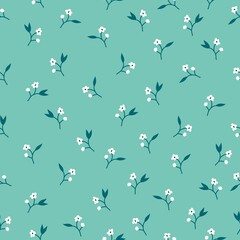 Vintage patroon. kleine witte bloemen, donkerblauw blad. licht turkooizen achtergrond. Naadloze vector sjabloon voor design en mode prints.