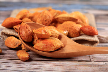 Badam, almonds is on the wooden table