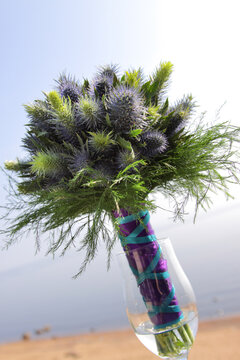 Bridal bouquet of eringium and asparagus