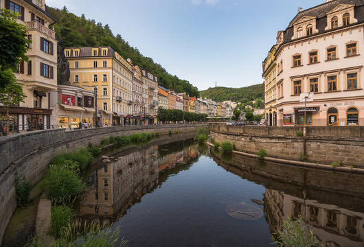 Karlovy Vary, Czech Republic, June 2019 - view of the some beautiful buildings by the Tepla River by the afternoon