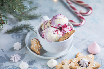 Candy Cane Ice Cream scoops  in cup and Christmas decor. New Year's desserts