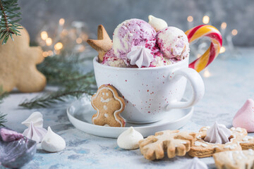 Candy Cane Ice Cream scoops  in cup and Christmas decor. New Year's desserts