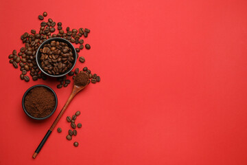 Ground coffee and roasted beans on red background, flat lay. Space for text