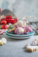 Candy Cane Ice Cream scoops  in plate and Christmas decor. New Year's desserts