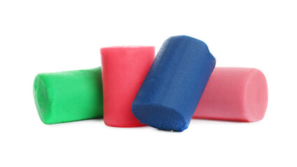 Different colorful play dough on white background