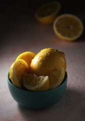 A bowl with yellow bright lemons