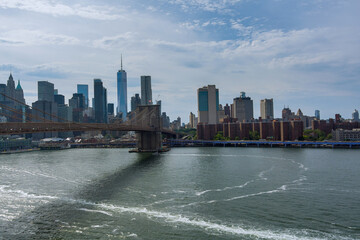 Brooklyn Bridge over East River view lower Manhattan waterfront New York City