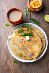 Paneer paratha is a popular North Indian flatbread made with whole wheat flour dough and stuffed...