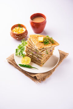 Paneer paratha is a popular North Indian flatbread made with whole wheat flour dough and stuffed with savory, spiced, grated paneer