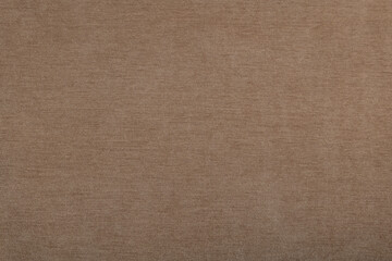 beige light brown fabric as a texture for upholstery of furniture, sofas