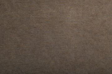 dark brown fabric as a texture for upholstery of furniture, sofas