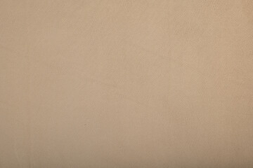 beige light brown fabric as a texture for upholstery of furniture, sofas